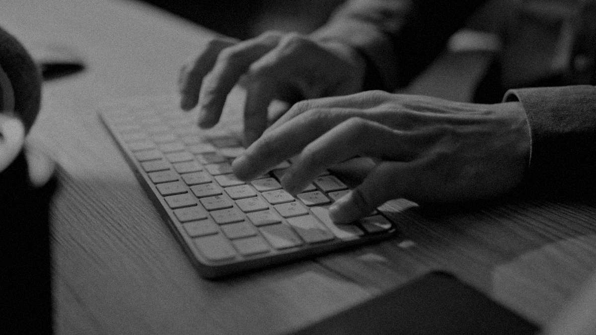 businessman hands typing keyboard office close up. freelancer working computer